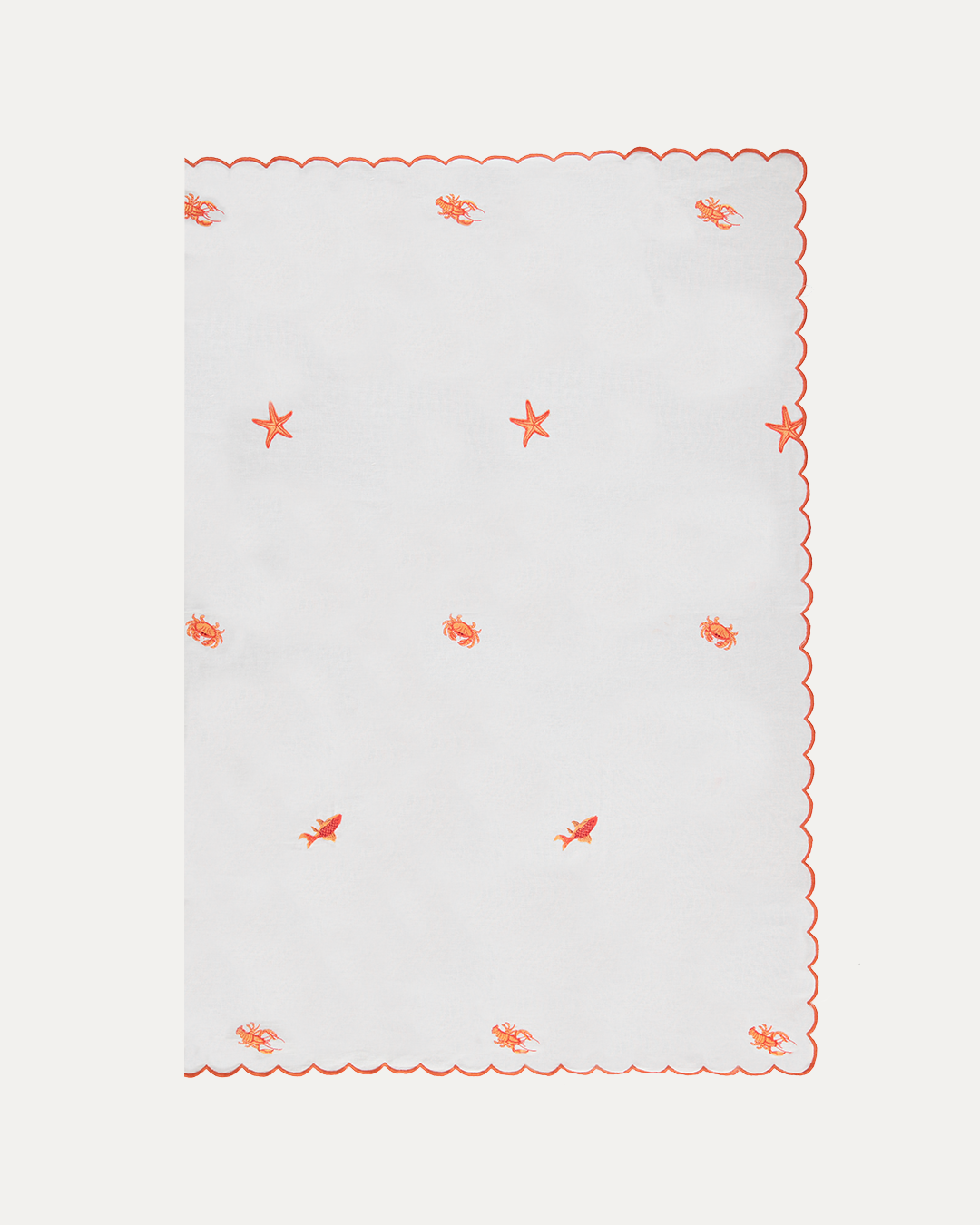 Nappe blanche brodée avec motifs marins